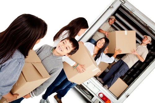 Man and van loading furniture for a Richmond property move