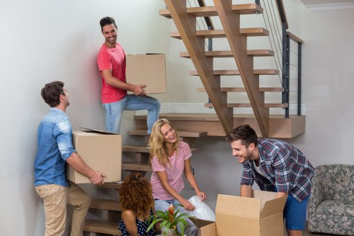 Staff checking and securing items during a removal job