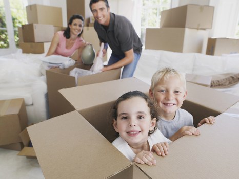 Moving home planning in Richmond with boxes and checklist