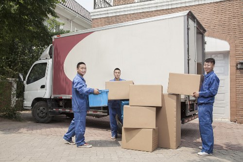 Man with van removal service operating in Richmond with local residential street context