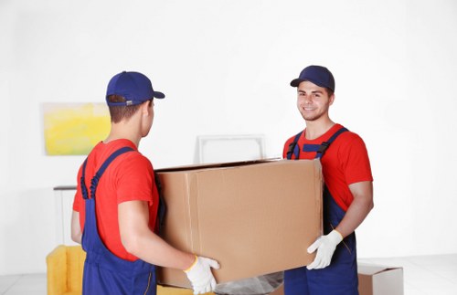 Man and van moving items in a Richmond residential street