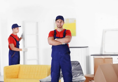 Moving team handling boxes safely during a Richmond Man And Van job