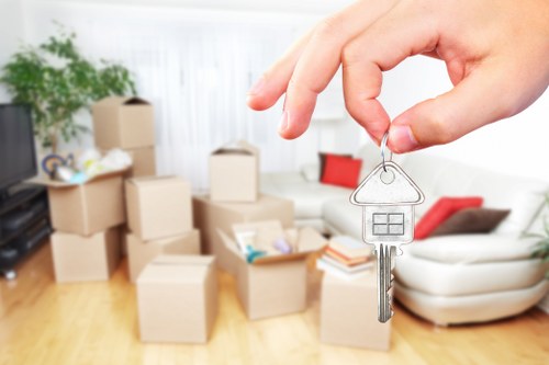 Professional movers loading items into a Richmond removal van