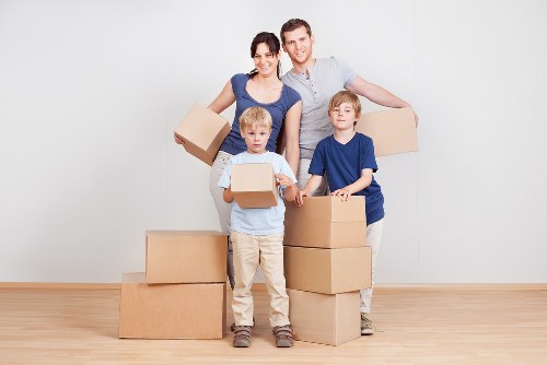 House moving team transporting furniture through Richmond streets