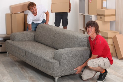 Team securing items safely inside a moving van