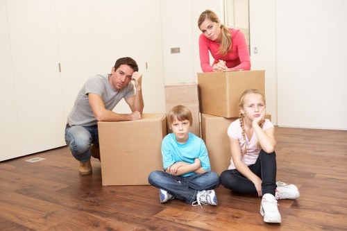 Local Richmond moving team handling household furniture safely