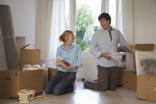 Packed boxes and furniture ready for a Richmond removal van