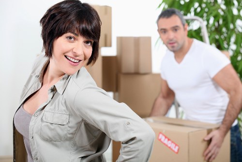 Prepared moving boxes and furniture ready for a Richmond man with van removal